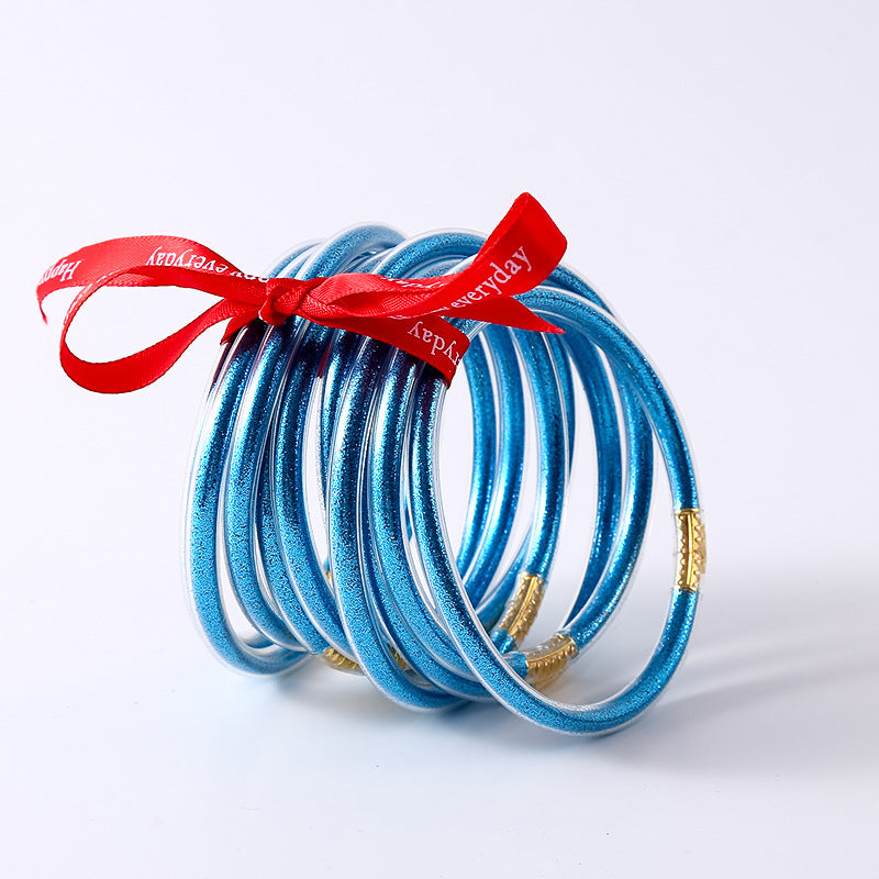 HOLLY | Set van 10 Glanzende Armbanden – Siliconen Glamour in Kleurenmix