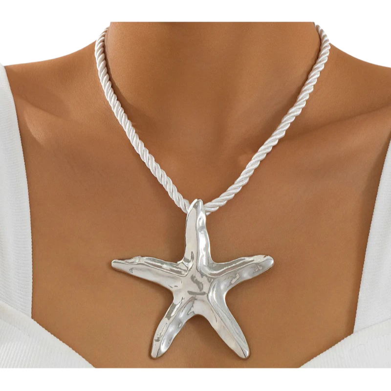 NIENE Statement Zeester Ketting – Zomers Eyecatcher in Goud of Zilver