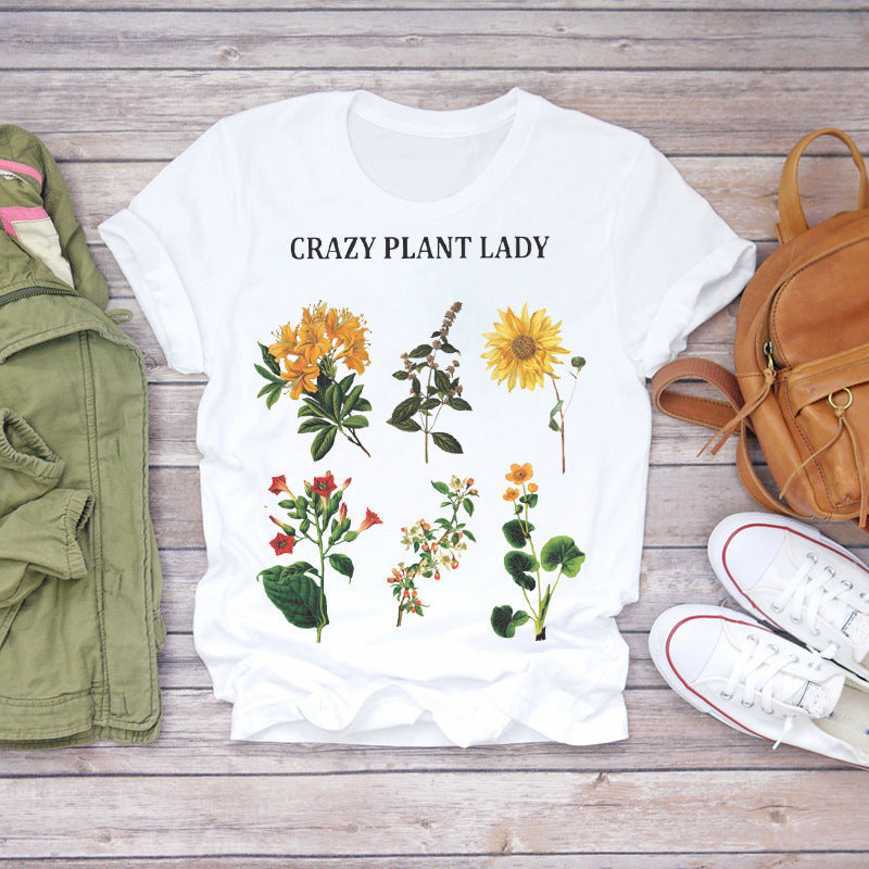 ROOS | Dames T-shirt “Bloom Where You Are Planted” – Wit Shirt met Bloemenprint