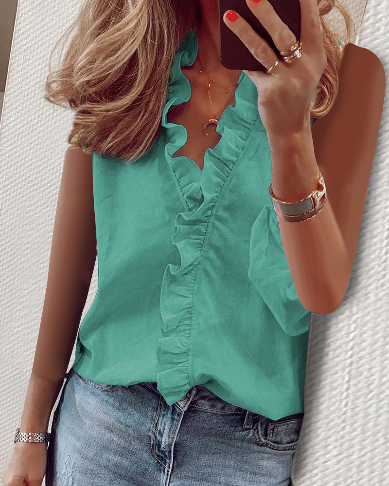 SILVIE | Ruffle V-Hals Top – Elegantie met een Speelse Twist