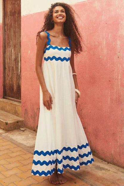 EMA | Scallop Maxi Jurk – Zomerse Flair met Speelse Schouderdetails