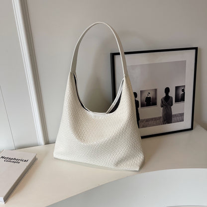 ARYA | Gevlochten Schoudertas – Minimalistische Handtas met Luxe Look