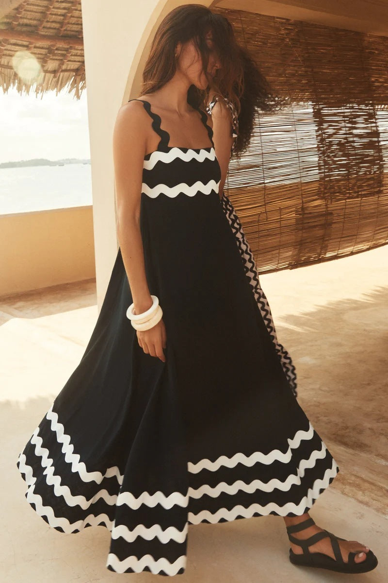 EMA | Scallop Maxi Jurk – Zomerse Flair met Speelse Schouderdetails