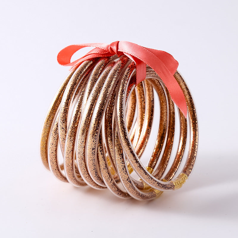 HOLLY | Set van 10 Glanzende Armbanden – Siliconen Glamour in Kleurenmix