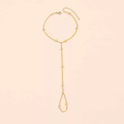 CHICA | Goudkleurige Handketting met Ring – Minimalistische Boho Chain Bracelet