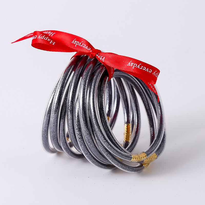 HOLLY | Set van 10 Glanzende Armbanden – Siliconen Glamour in Kleurenmix