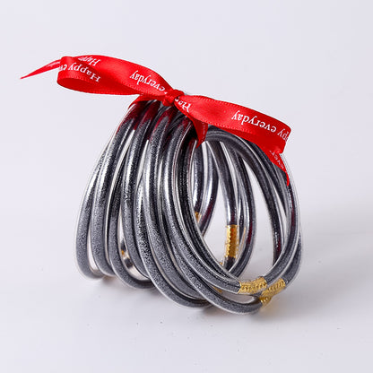 HOLLY | Set van 10 Glanzende Armbanden – Siliconen Glamour in Kleurenmix