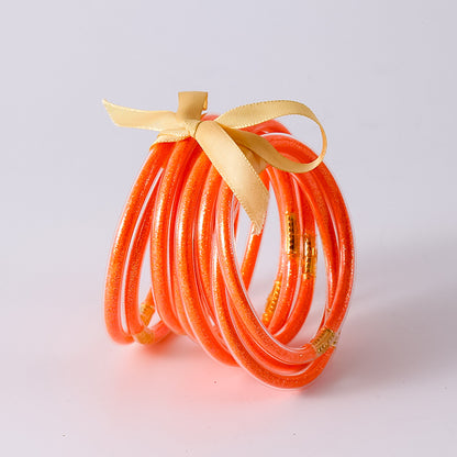 HOLLY | Set van 10 Glanzende Armbanden – Siliconen Glamour in Kleurenmix