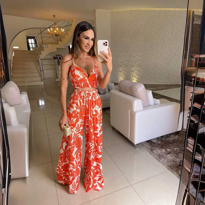 LYNDY | Zomer Jumpsuit met Oranje Bloemenprint – Vrouwelijk & Comfortabel