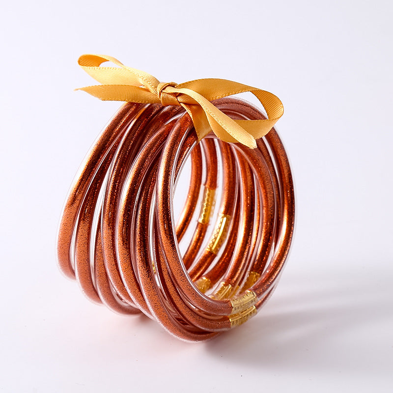 HOLLY | Set van 10 Glanzende Armbanden – Siliconen Glamour in Kleurenmix