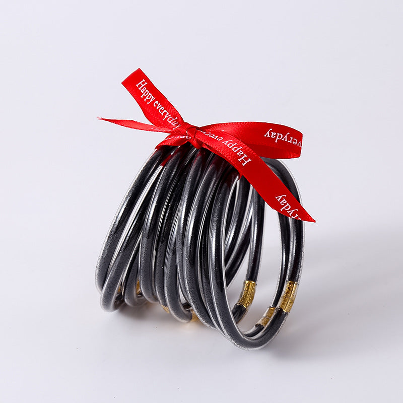 HOLLY | Set van 10 Glanzende Armbanden – Siliconen Glamour in Kleurenmix