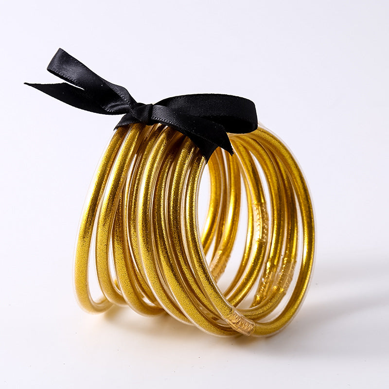 HOLLY | Set van 10 Glanzende Armbanden – Siliconen Glamour in Kleurenmix