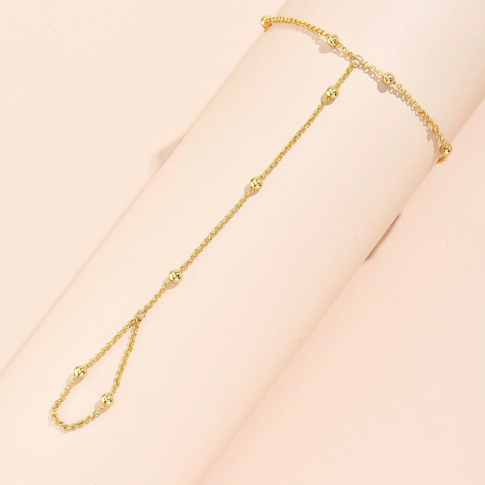 CHICA | Goudkleurige Handketting met Ring – Minimalistische Boho Chain Bracelet