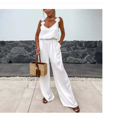 HIND | Dames Jumpsuit met Bloemdetail – Mouwloos & Wijde Pijpen